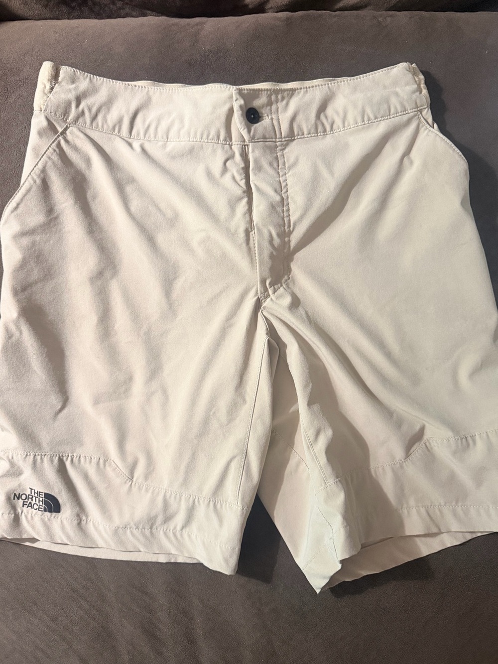 The North Face Men’s Cream Outdoor Hybrid Shorts with mesh pockets